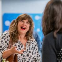 Attendee checking in at event table